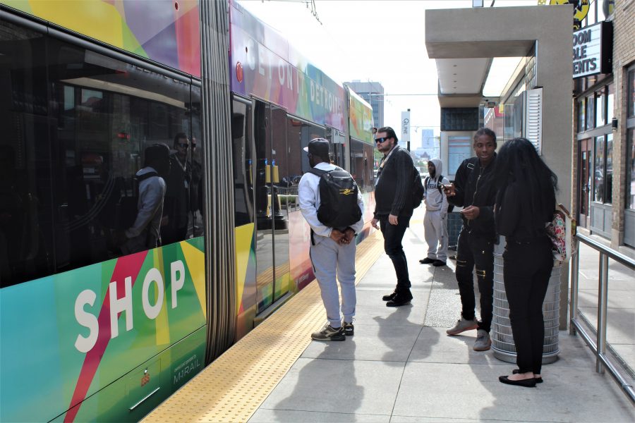 People waiting for the Qline