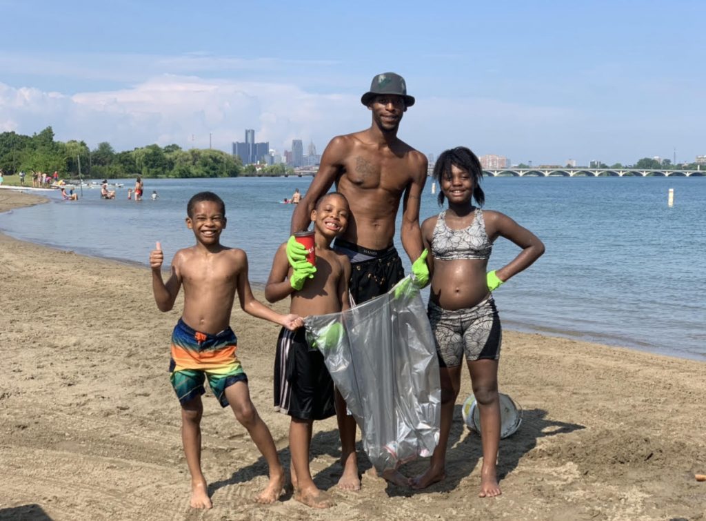 group belle isle trash pickup beach litter