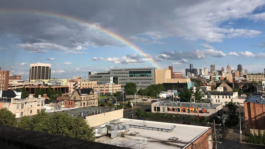 Detroit summer skyline with a rainbow.