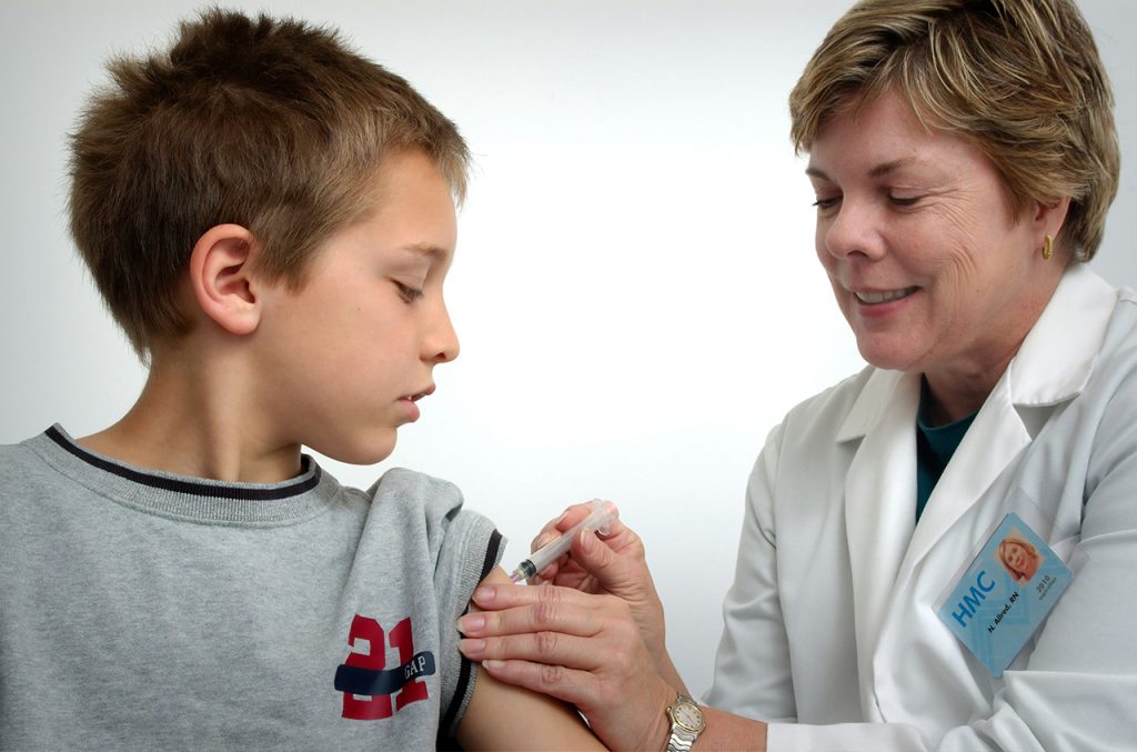 Kid receiving a vaccine 2