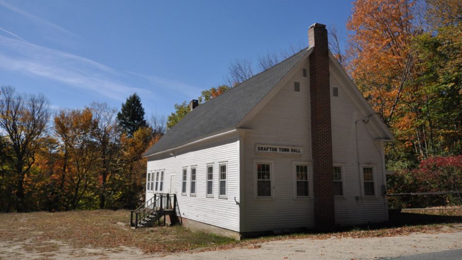 A single-story white building that serves as Grafton's town hall