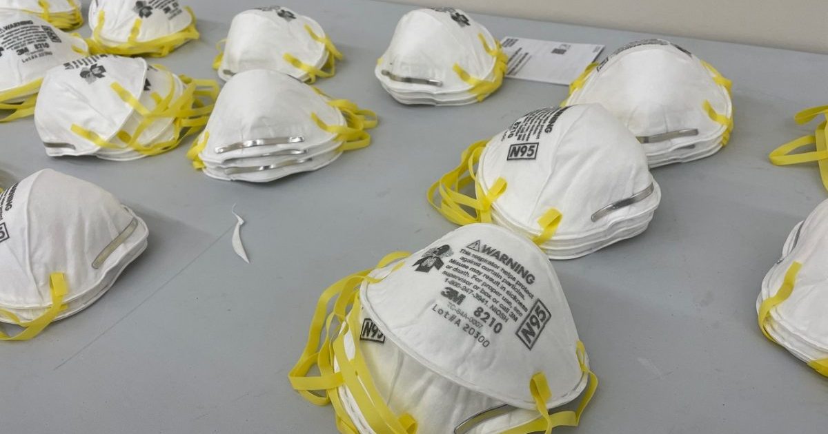 N95 face masks stacked on a table