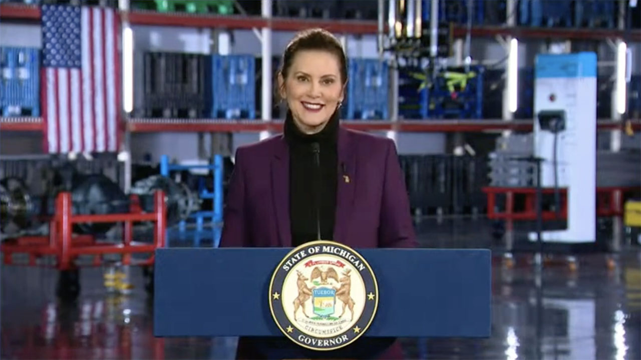 Gov. Gretchen Whitmer speaking behind a podium