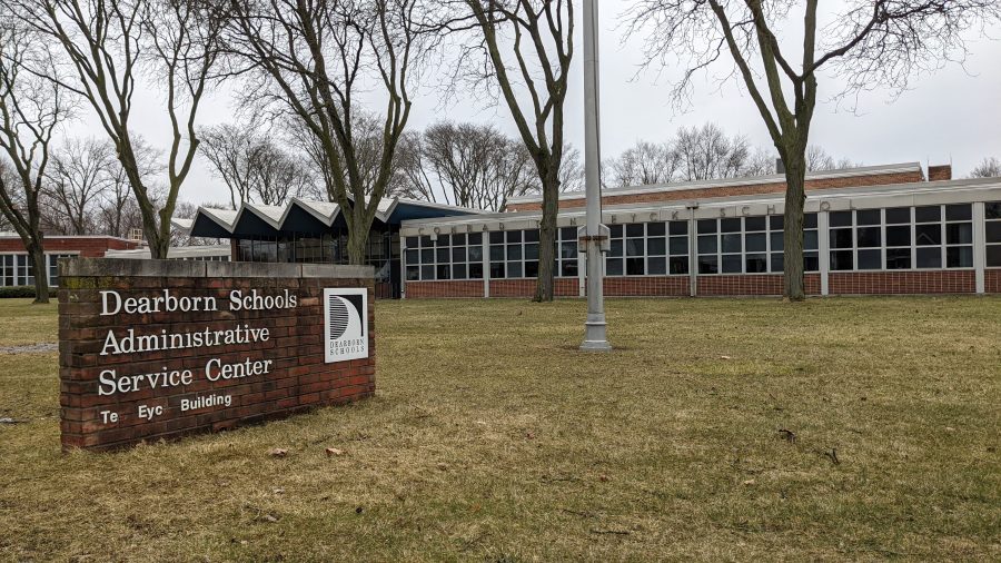 exterior of an administrative office building with a sign that reads, "Dearborn Schools Administrative Service Center."