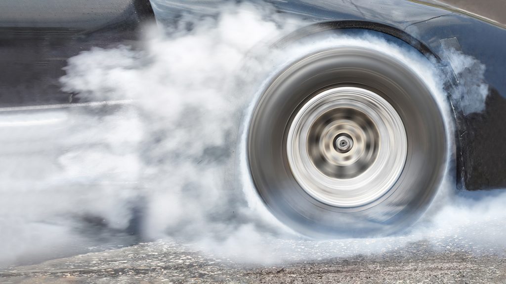 Drag Racing Car Burns Rubber Off Its Tires