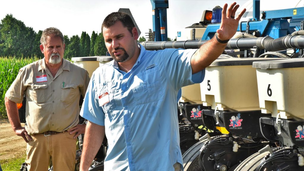 Michigan farmers Jim Isley, left, and his son, Jake