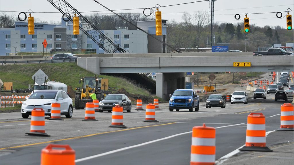 Orange barrels on a highway