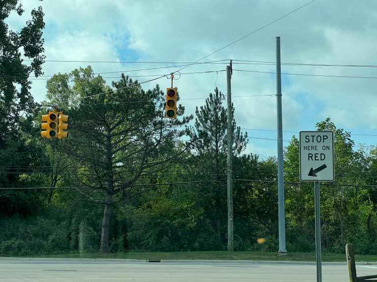 traffic lights go dark at an intersection during the August 2022 power outage