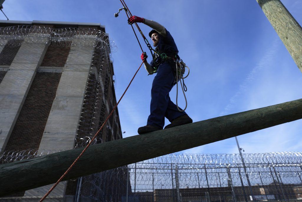 Prisoner Scott Steffes works on climbing at the Parnall Correctional Facility's Vocational Village in Jackson, Mich., Thursday, Dec. 1, 2022.