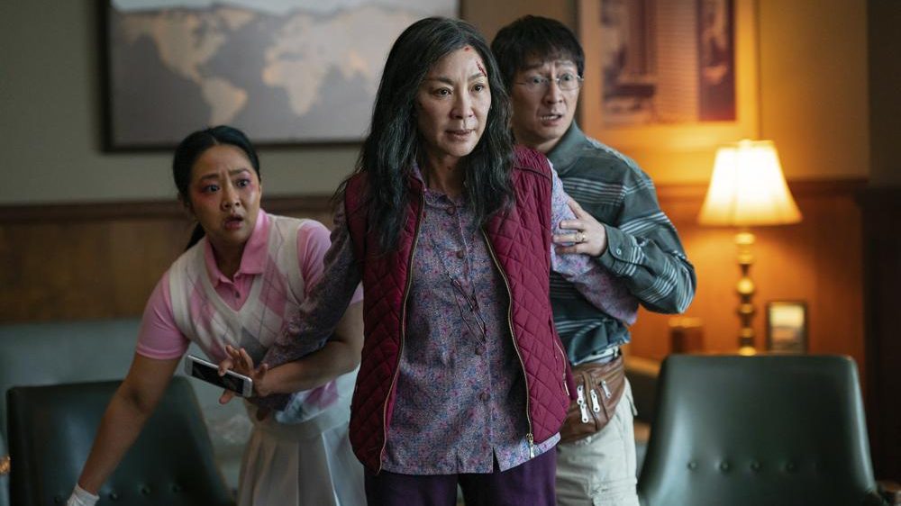 This image released by A24 Films shows, from left, Stephanie Hsu, Michelle Yeoh and Ke Huy Quan in a scene from, "Everything Everywhere All At Once." (Allyson Riggs/A24 Films via AP)