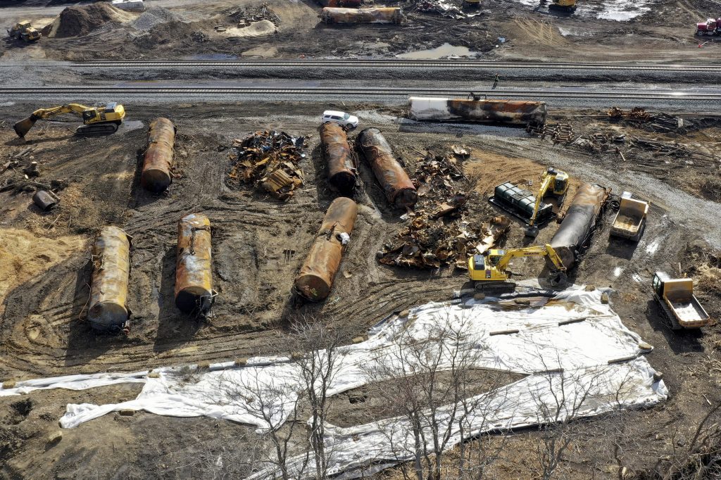 A view of the scene Friday, Feb. 24, 2023, as the cleanup continues at the site of of a Norfolk Southern freight train derailment that happened on Feb. 3 in East Palestine, Ohio. (AP Photo/Matt Freed)