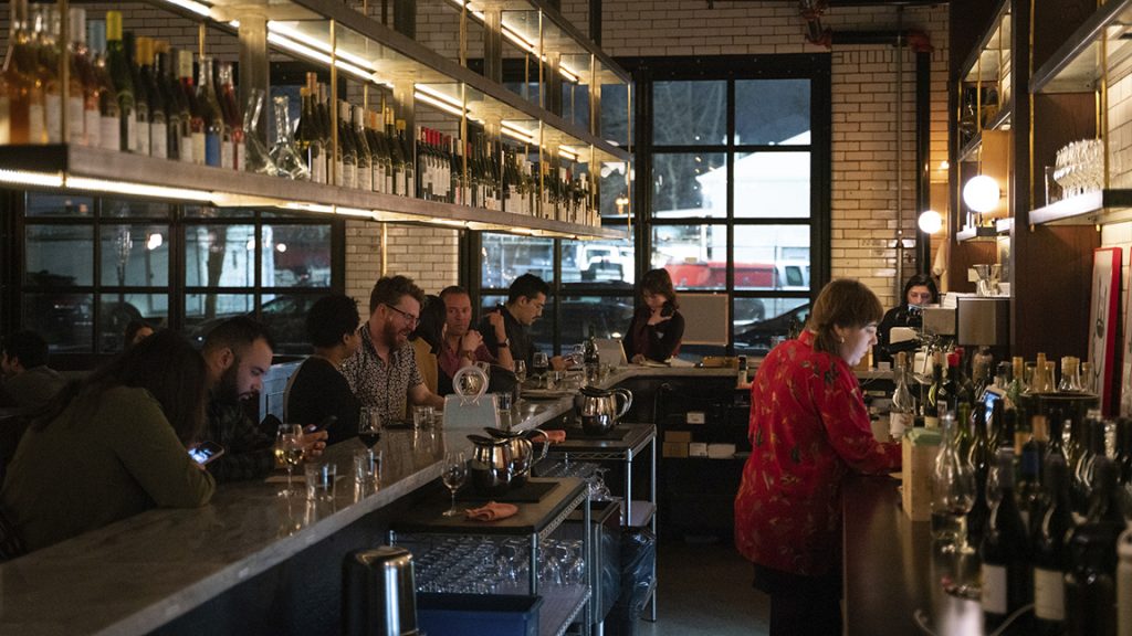 People dine at Ladder 4 Wine Bar, which was formerly a fire station in Detroit, Friday, Feb. 10, 2023.