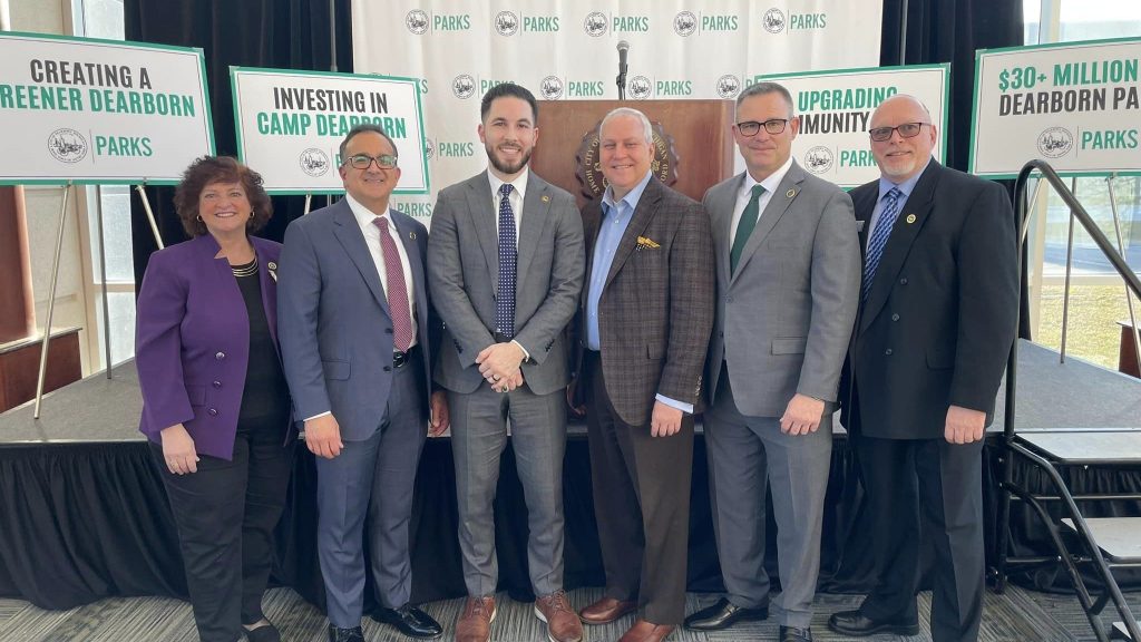 City of Dearborn officials pose for a photo after announcing a $30 million park development project.