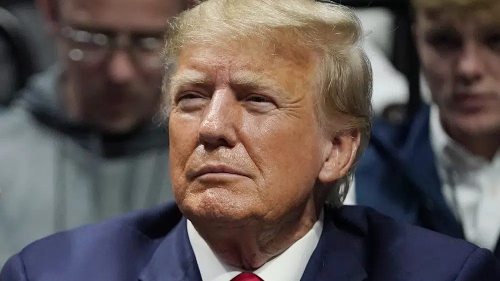 Former President Donald J. Trump watches the NCAA Wrestling Championships, Saturday, March 18, 2023, in Tulsa, Okla.