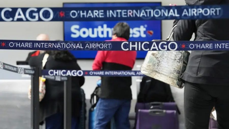 Travelers check in at a Southwest Airlines ticket counter at O'Hare International Airport in Chicago, Tuesday, April 18, 2023. Southwest Airlines planes were grounded nationwide for what the airline called an intermittent technology issue, causing more than 1,700 flight delays Tuesday just four months after the carrier suffered a meltdown over the Christmas travel rush. (AP Photo/Nam Y. Huh)