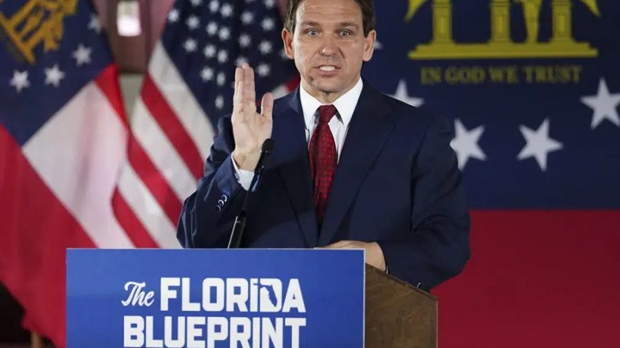 Florida Gov. Ron DeSantis speaks to a crowd at Adventure Outdoors gun store, Thursday, March 30, 2023, in Smyrna, Ga.