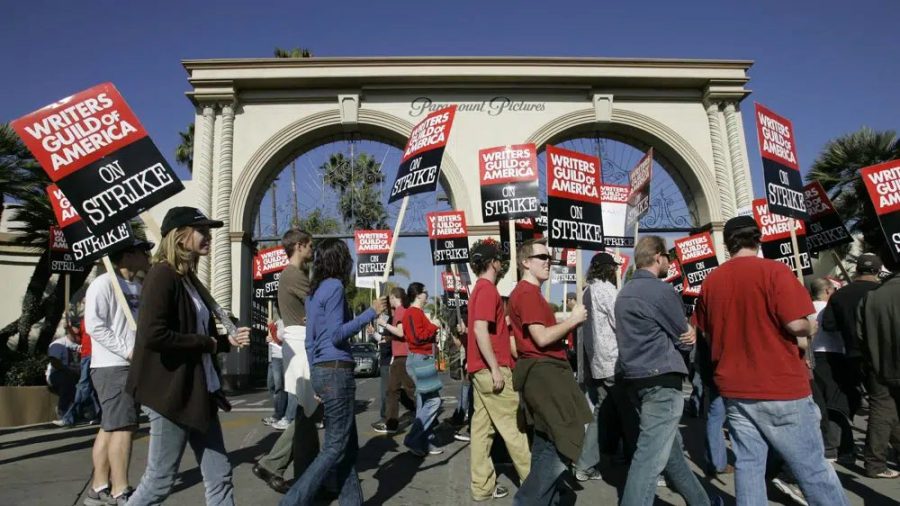 Striking writers walk the picket line outside Paramount Studios on Dec. 13, 2007, in Los Angeles.