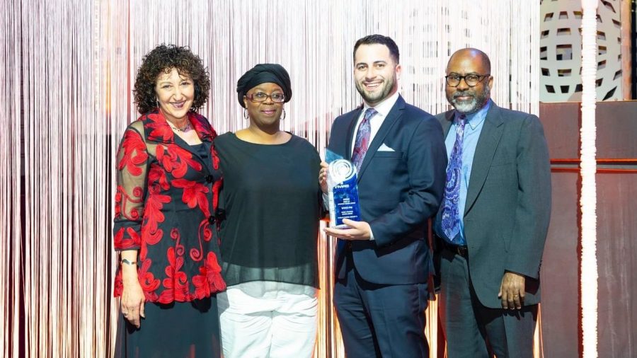 Mary Zatina, Sascha Raiyn, Eli Newman, Jerome Vaughn pose with their MAB Station of the Year for 2022 award.