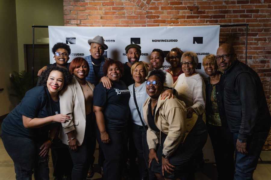 NowIncluded team members smile for a group photo