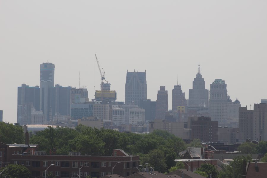 A photo of the Detroit skyline's reduced visibility due to poor air quality in Detroit, Mich. on June 7, 2023.