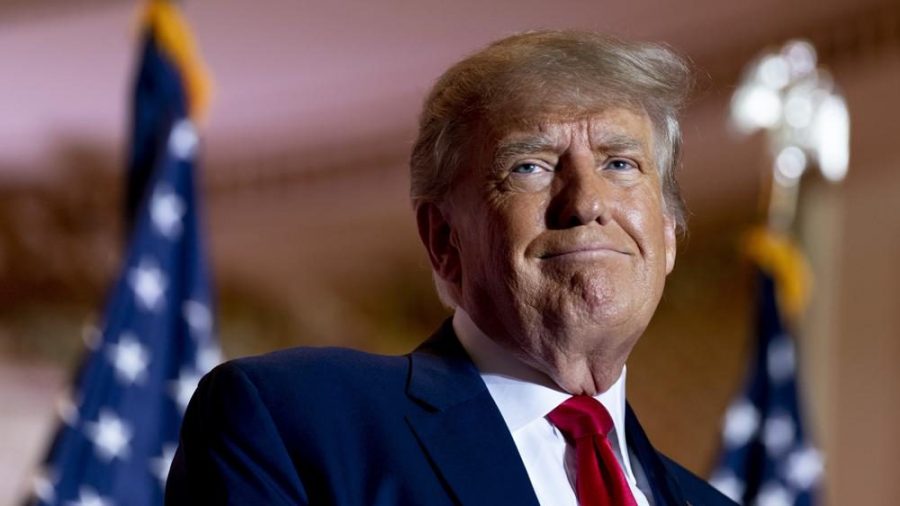 Former President Donald Trump announces he is running for president for the third time as he smiles while speaking at Mar-a-Lago in Palm Beach, Fla., Nov. 15, 2022.