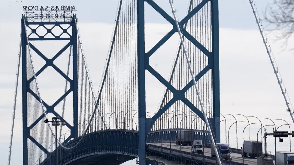 Traffic flows over the Ambassador Bridge in Detroit, Feb. 14, 2022.