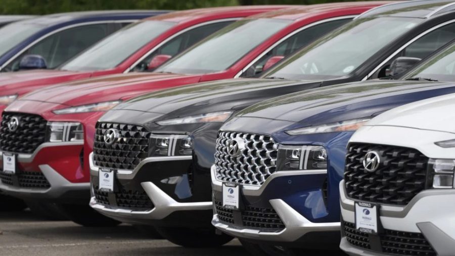 FILE - A line of 2022 Santa Fe SUV's sit outside a Hyundai dealership Sunday, Sept. 12, 2021, in Littleton, Colo.