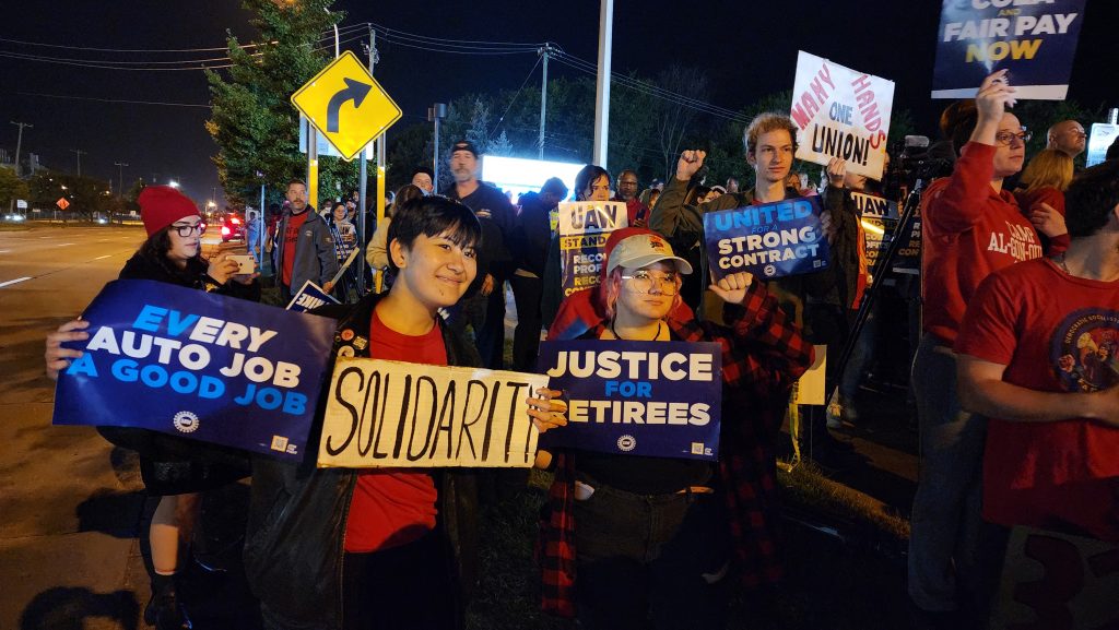 UAW members picket outside Ford's assembly plant on Sept. 15, 2023, in Wayne, Mich.