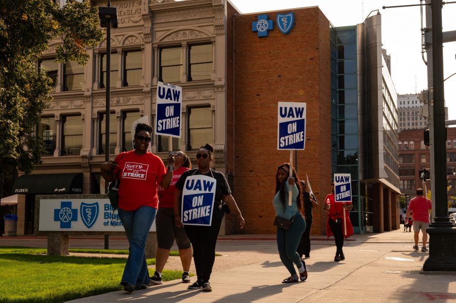 Striking Blue Cross Blue Shield of Michigan workers picket in downtown Detroit.