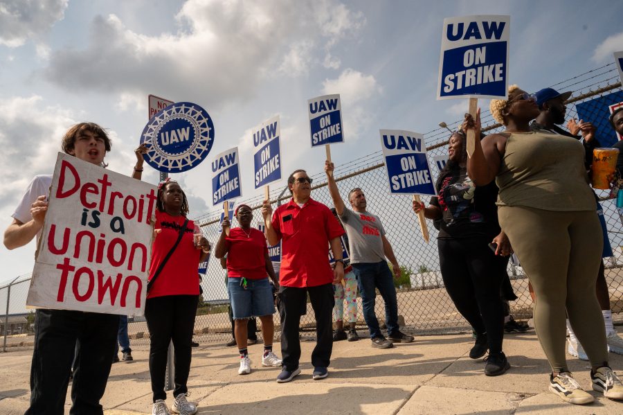 Striking workers picket near a Mopar Parts Distribution Center in Center Line, Michigan.