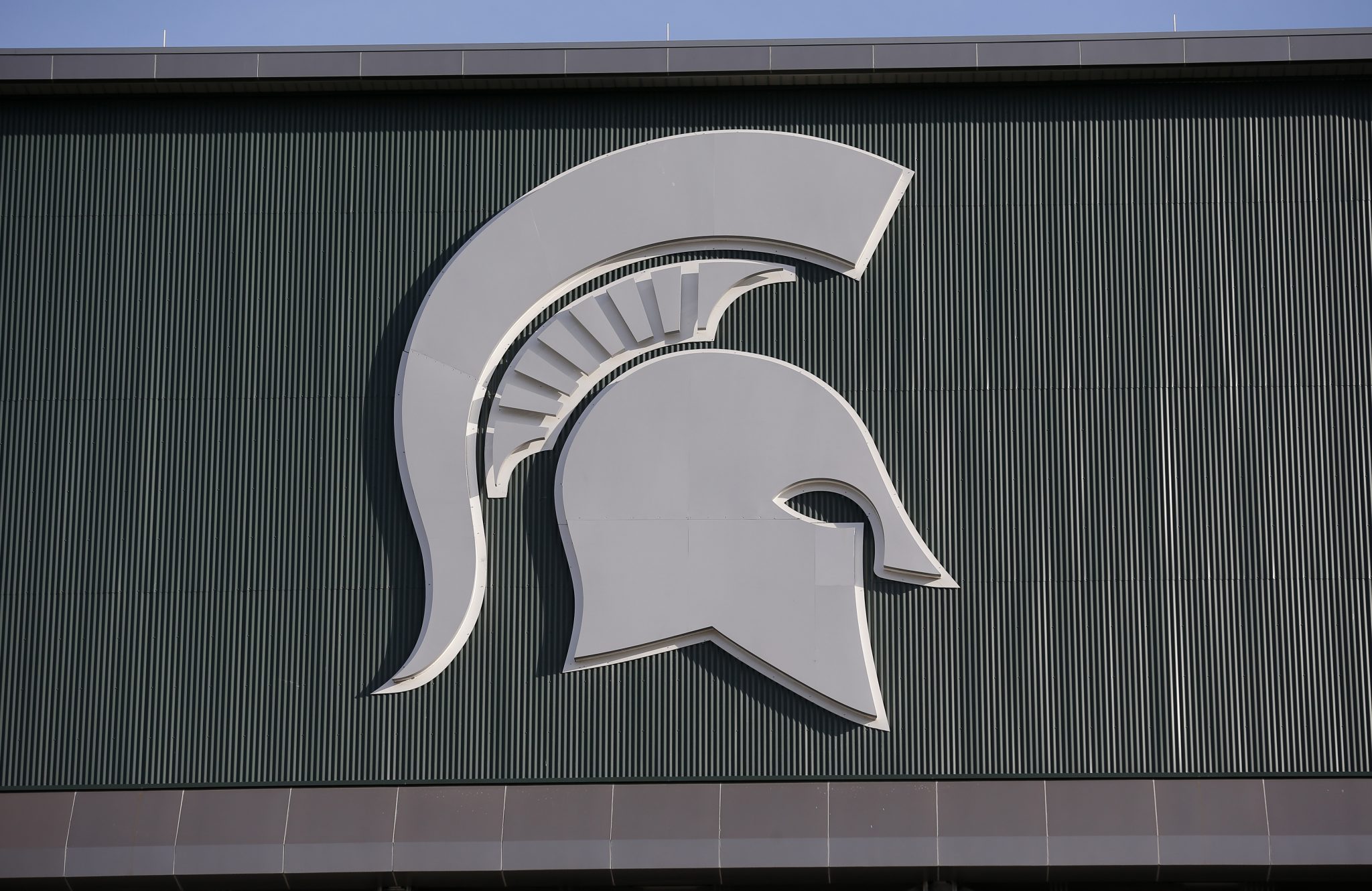 Michigan State's logo is seen on Spartan Stadium before the start of an NCAA college football game between Michigan State and Tulsa, Friday, Aug. 30, 2019, in East Lansing, Mich.