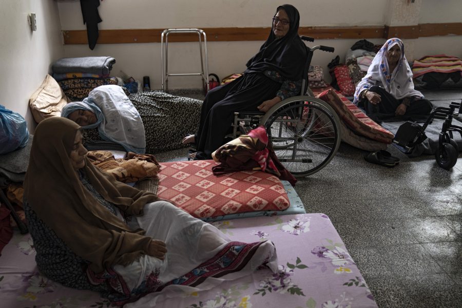 Palestinians take shelter from Israeli bombardment at a school in Khan Younis, Gaza Strip, Monday, Oct.16, 2023.