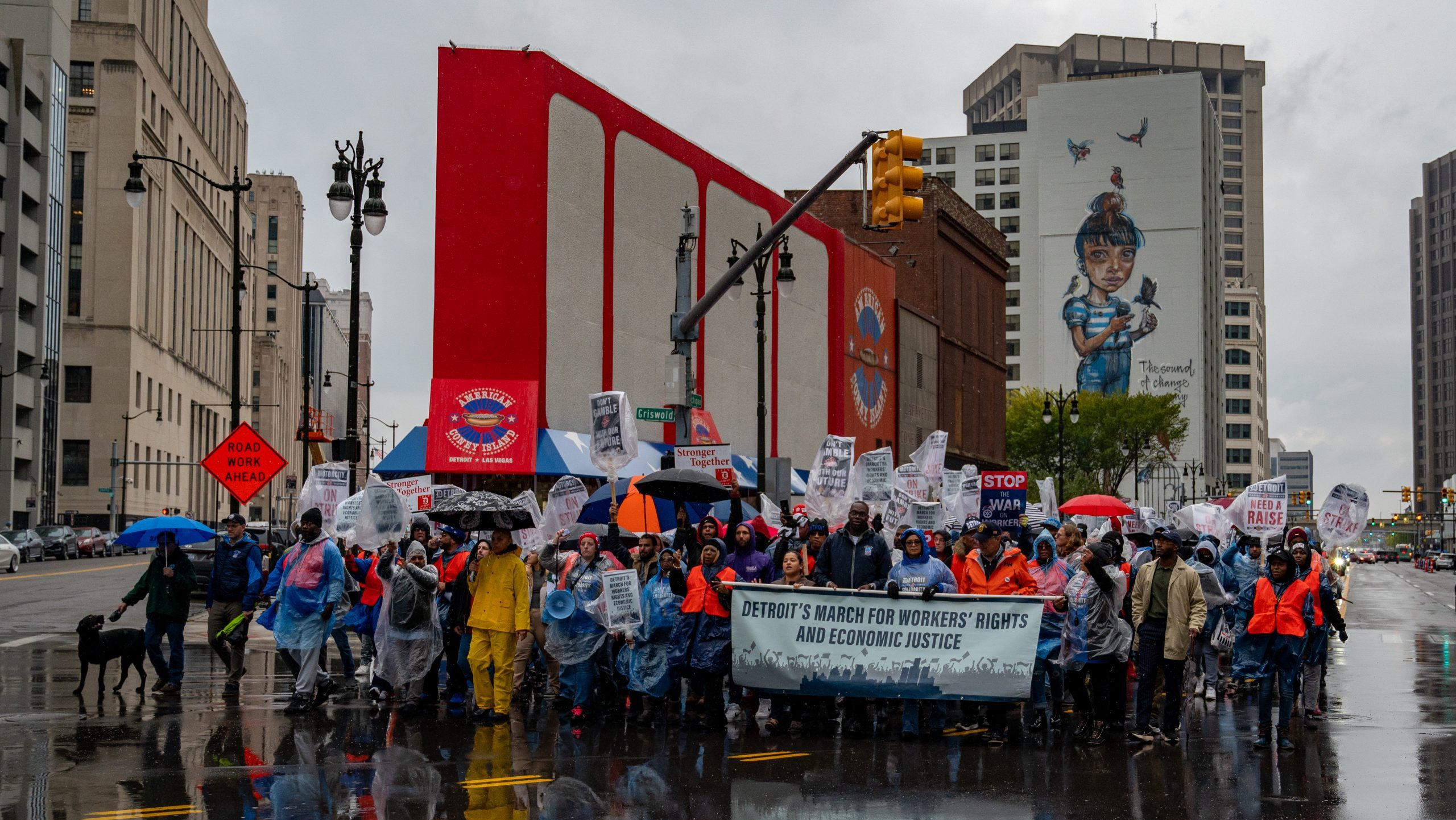 Striking union members and supporters march in Detroit to rally for a new contract on Oct. 19, 2023.