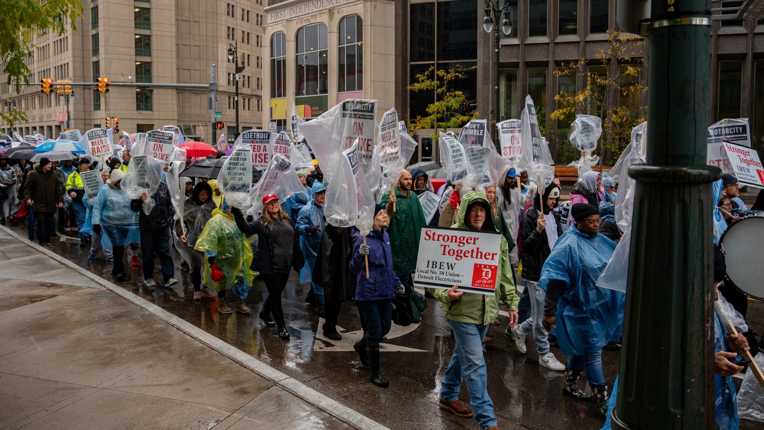 Striking union members and supporters march in Detroit to rally for a new contract on Oct. 19, 2023.