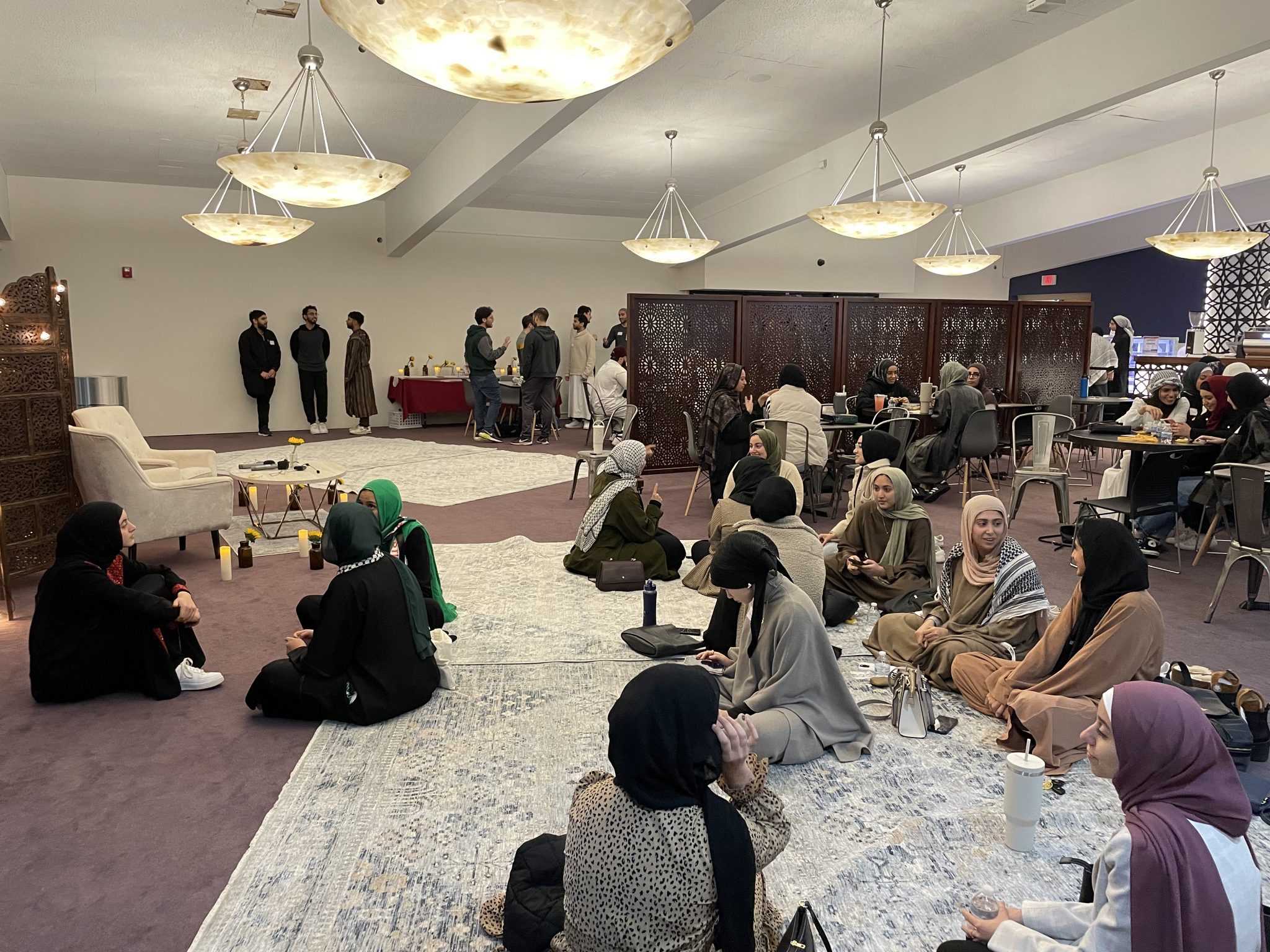 The second session of Thabaat takes place in a common room where people can sit to listen to a lecture discussion style portion of the program.