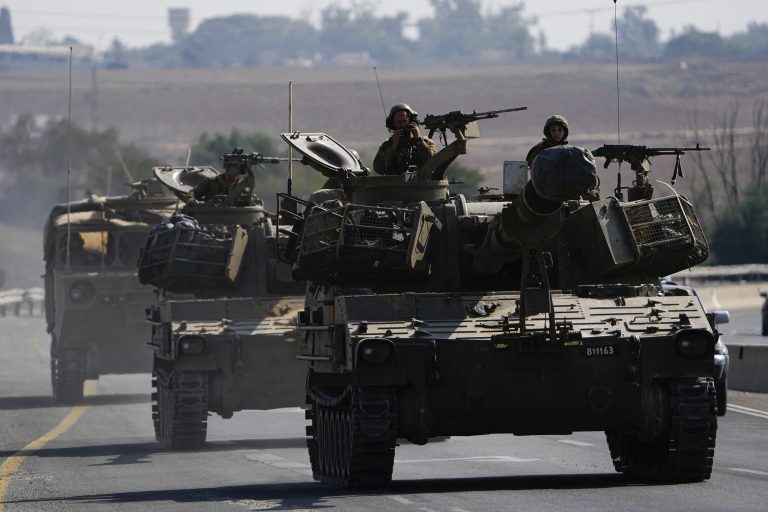 Israeli armored personnel carriers and tanks move towards the Gaza Strip border in southern Israel Wednesday, Nov. 1, 2023.
