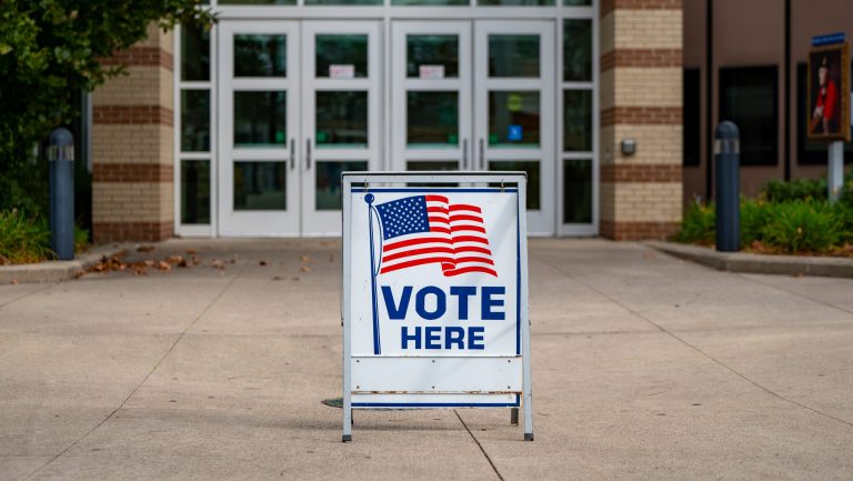 A "Vote Here" sign outside a voting location in Michigan on Election Day 2023.