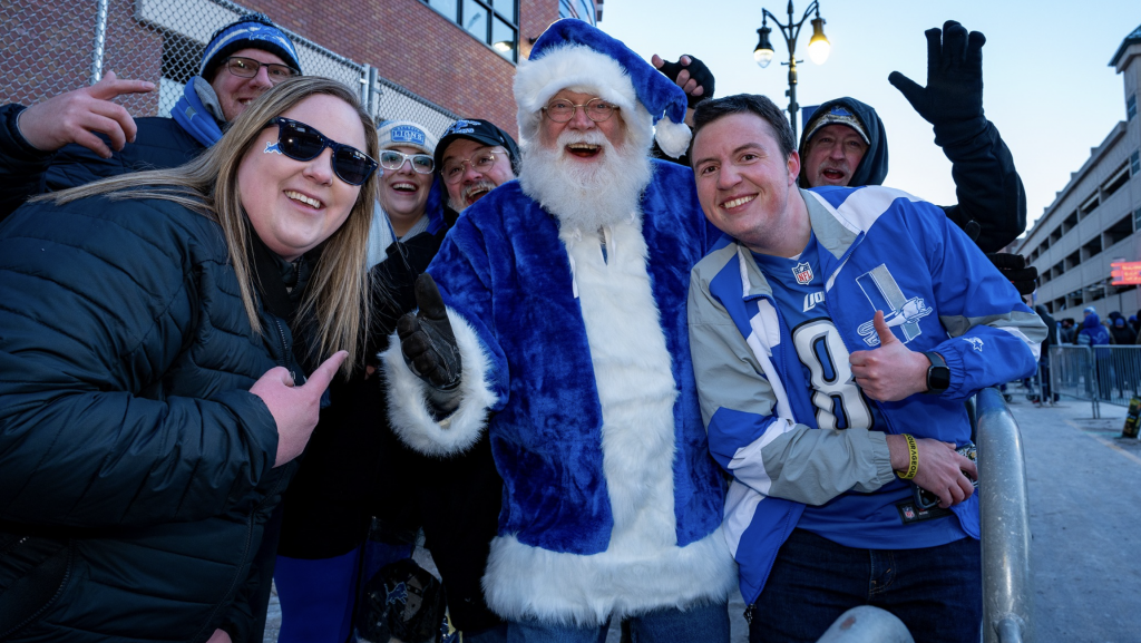 Lions fans celebrate outside Ford Field on Sunday, Jan. 14, 2024.