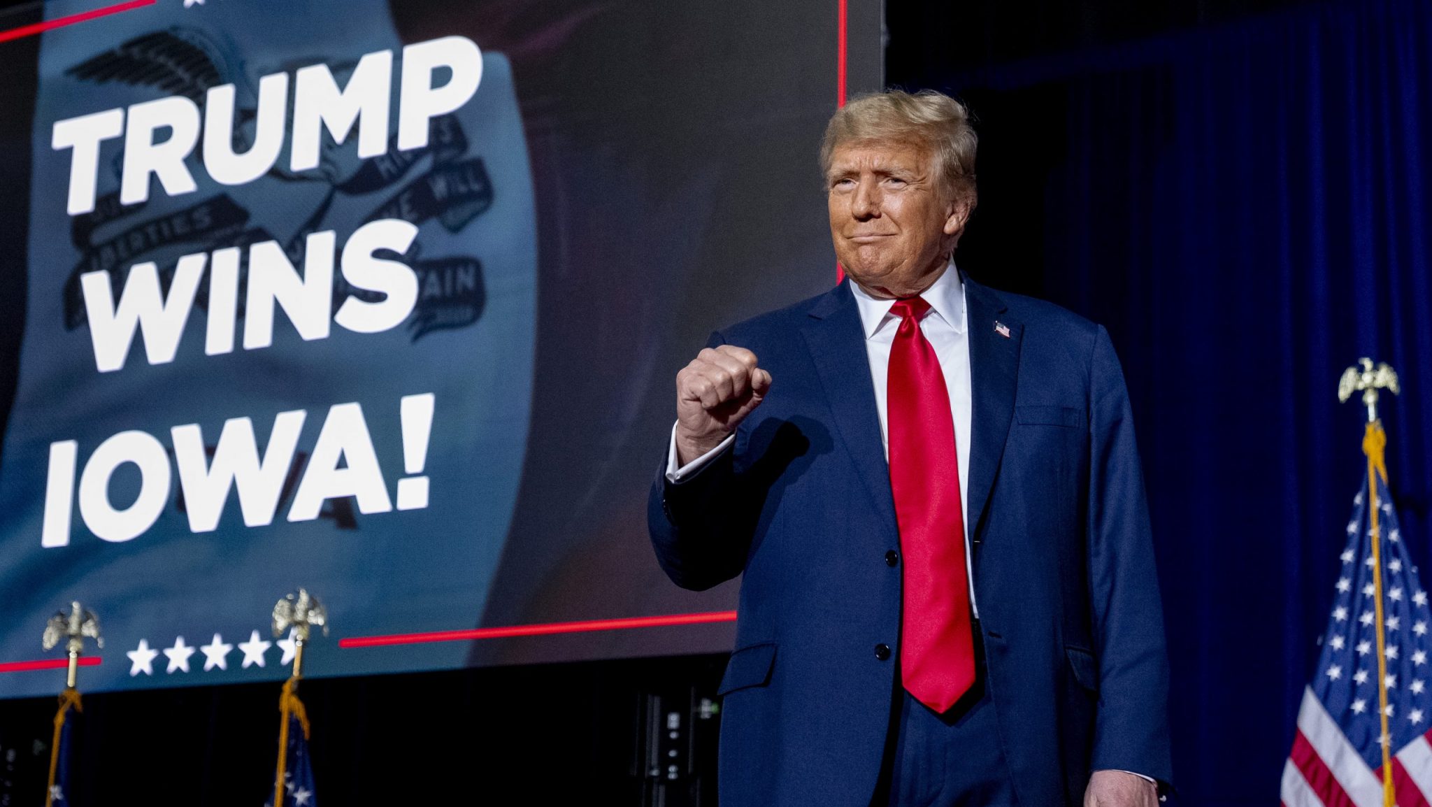 Republican presidential candidate former President Donald Trump takes the stage at a caucus night party in Des Moines, Iowa, Monday, Jan. 15, 2024.