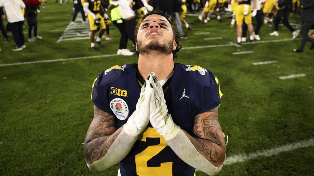 Michigan running back Blake Corum (2) reacts after an overtime win over Alabama at the Rose Bowl CFP NCAA semifinal college football game Monday, Jan. 1, 2024, in Pasadena, Calif. (AP Photo/Kyusung Gong)