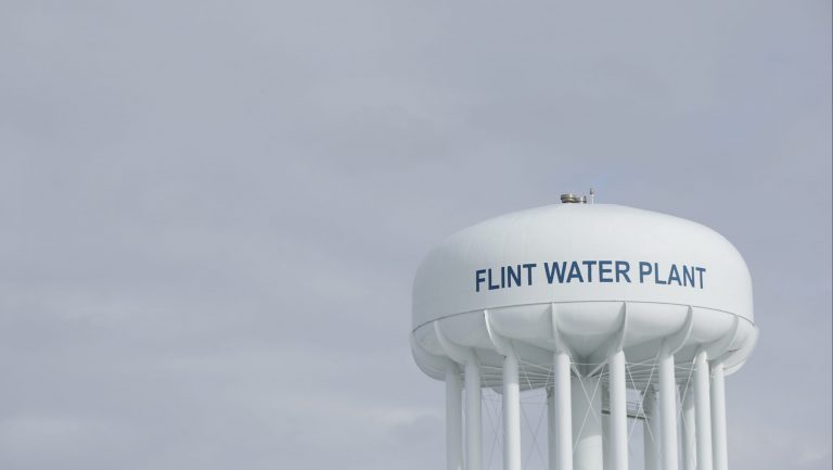 FILE - The Flint Water Plant tower is seen, Friday, Feb. 26, 2016 in Flint, Mich.