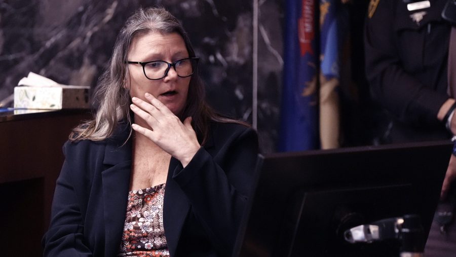 Jennifer Crumbley looks at a monitor as she testifies during her trial in the Oakland County courtroom Friday, Feb. 2, 2024, in Pontiac, Mich.