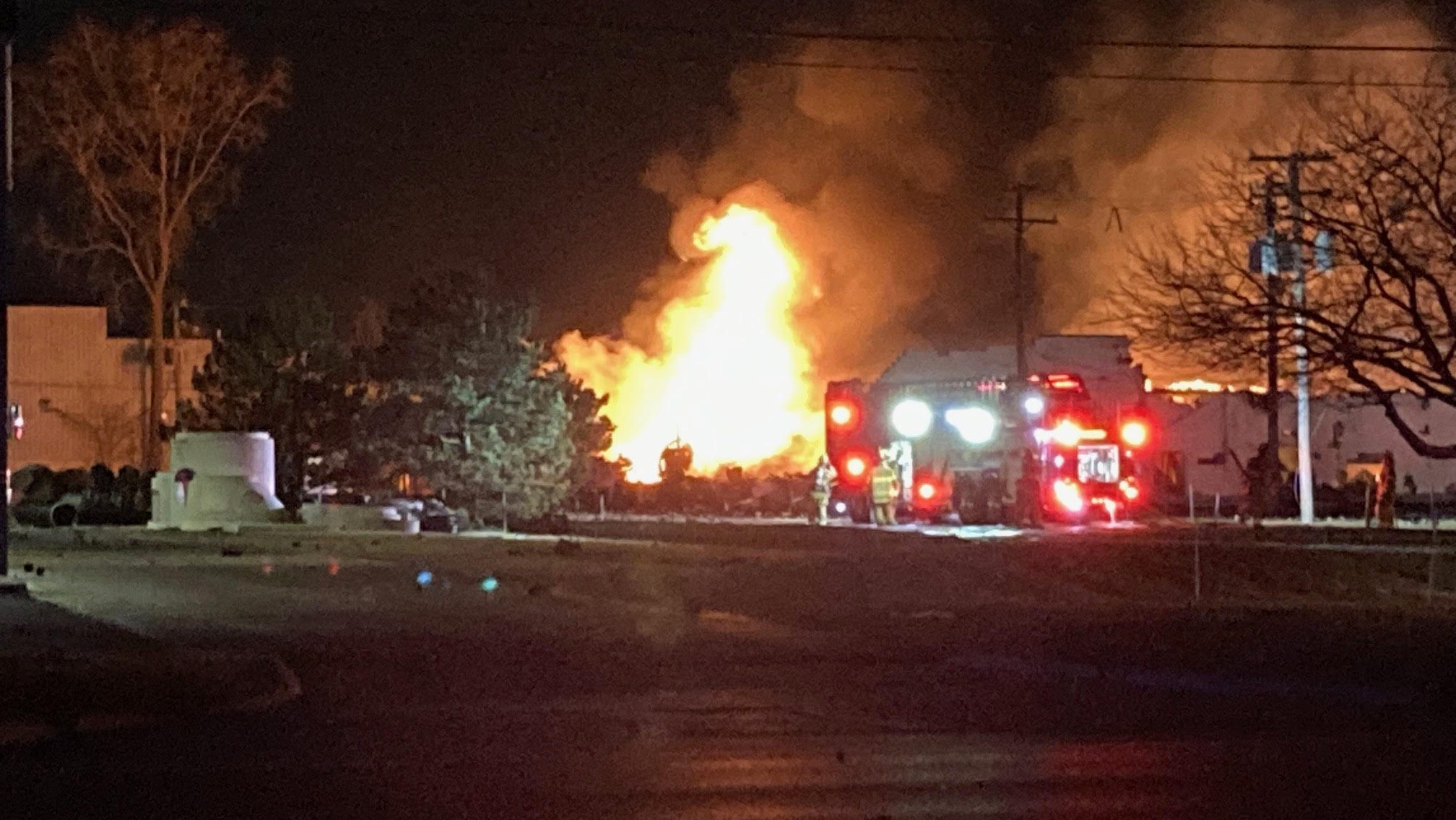 Firefighters battled an industrial fire that killed one person and injured a firefighter in Clinton Township late Monday, March 4, 2024.