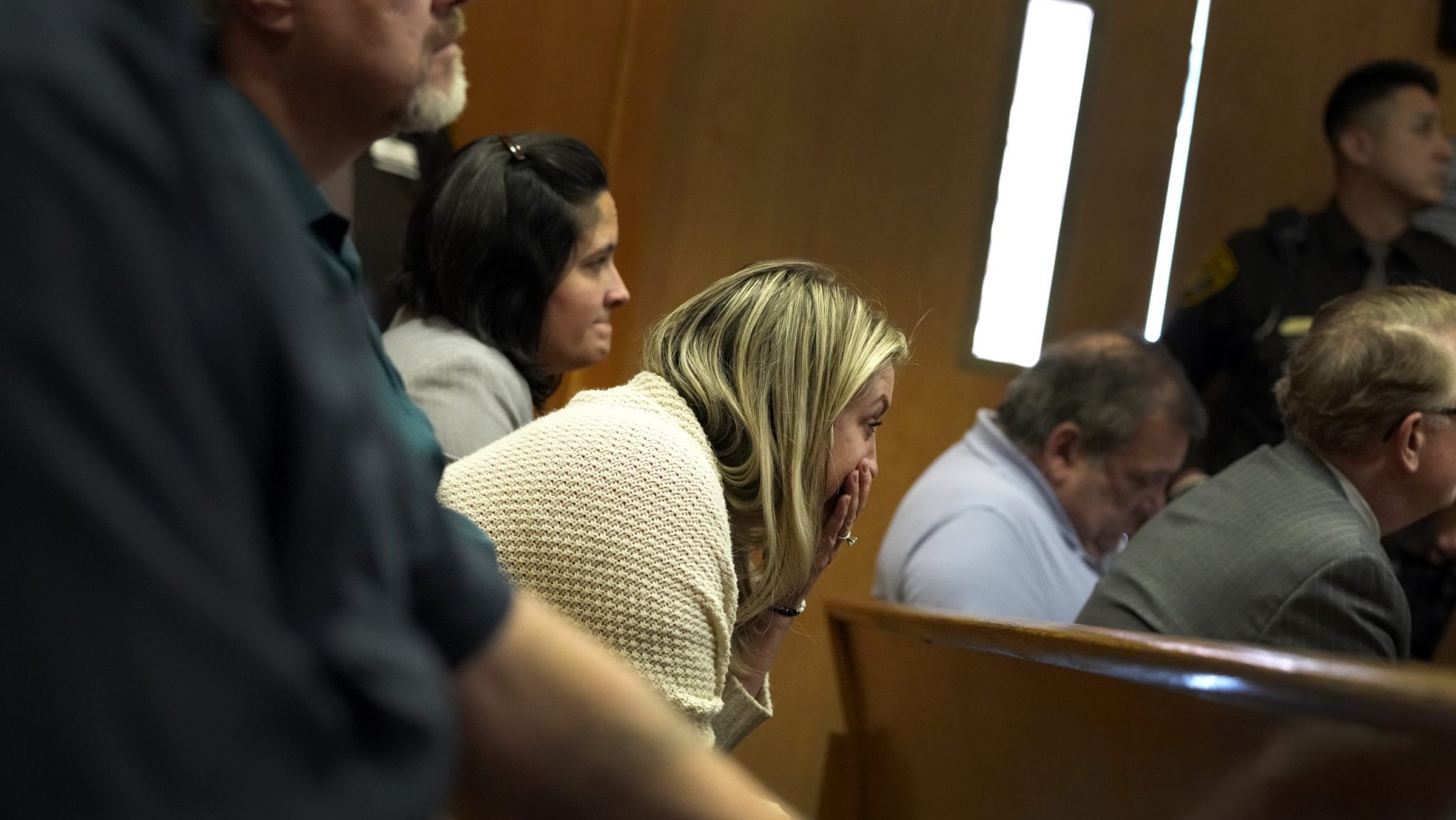 Nicole Beausoleil, mother of Oxford High shooting victim Madisyn Baldwin, sits as video is played showing the shooting at Oxford H.S., Tuesday, March 12, 2024, in Pontiac, Mich. James Crumbley is the father of Ethan Crumbley, who killed four students and wounded more at Oxford High School and is charged with involuntary manslaughter for failing to safely store a handgun used by his son in the 2021 attack and ignoring signs of the boy's mental despair.