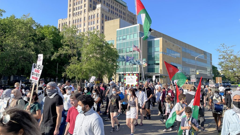 Pro-Palestinian protesters march along Wayne State University's campus in Detroit on May 23, 2024.