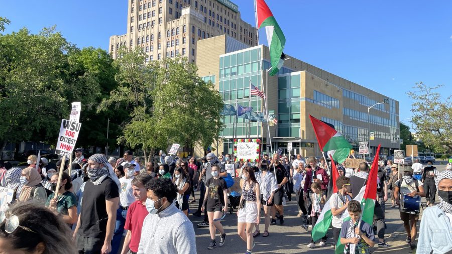 Pro-Palestinian protesters march along Wayne State University's campus in Detroit on May 23, 2024.