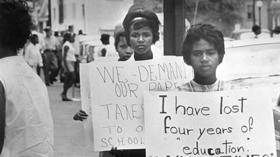 Students in Farmville, Va., protest against the school board's decision to close their school for five years rather than integrate following the Brown v. Board of Education Supreme Court decision.