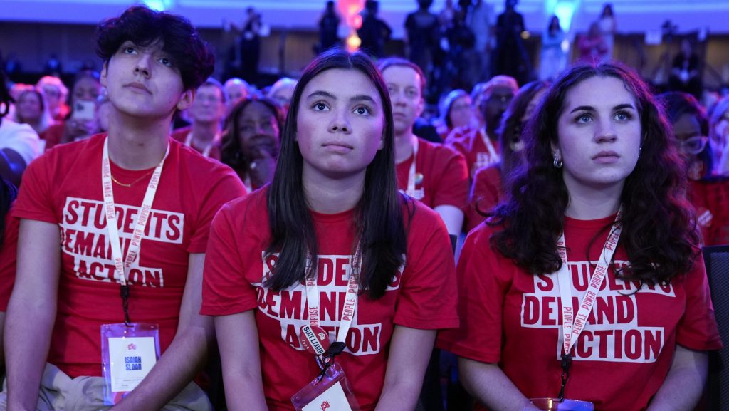 People listen as President Joe Biden speaks to Everytown for Gun Safety Action Fund's "Gun Sense University," at the Washington Hilton, Tuesday, June 11, 2024, in Washington.