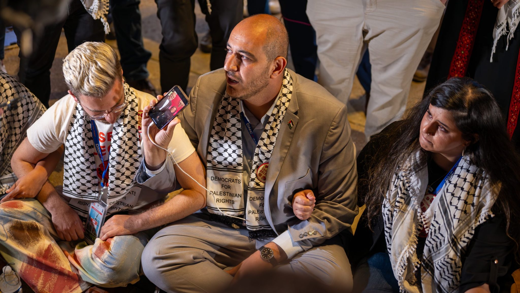 Abbas Alawieh, a delegate from Michigan and co-founder of the Uncommitted National Movement, at a sit-in protest against party leadership's refusal to allow a Palestinian American delegate to speak at the Democratic National Convention, Aug. 21, 2024.