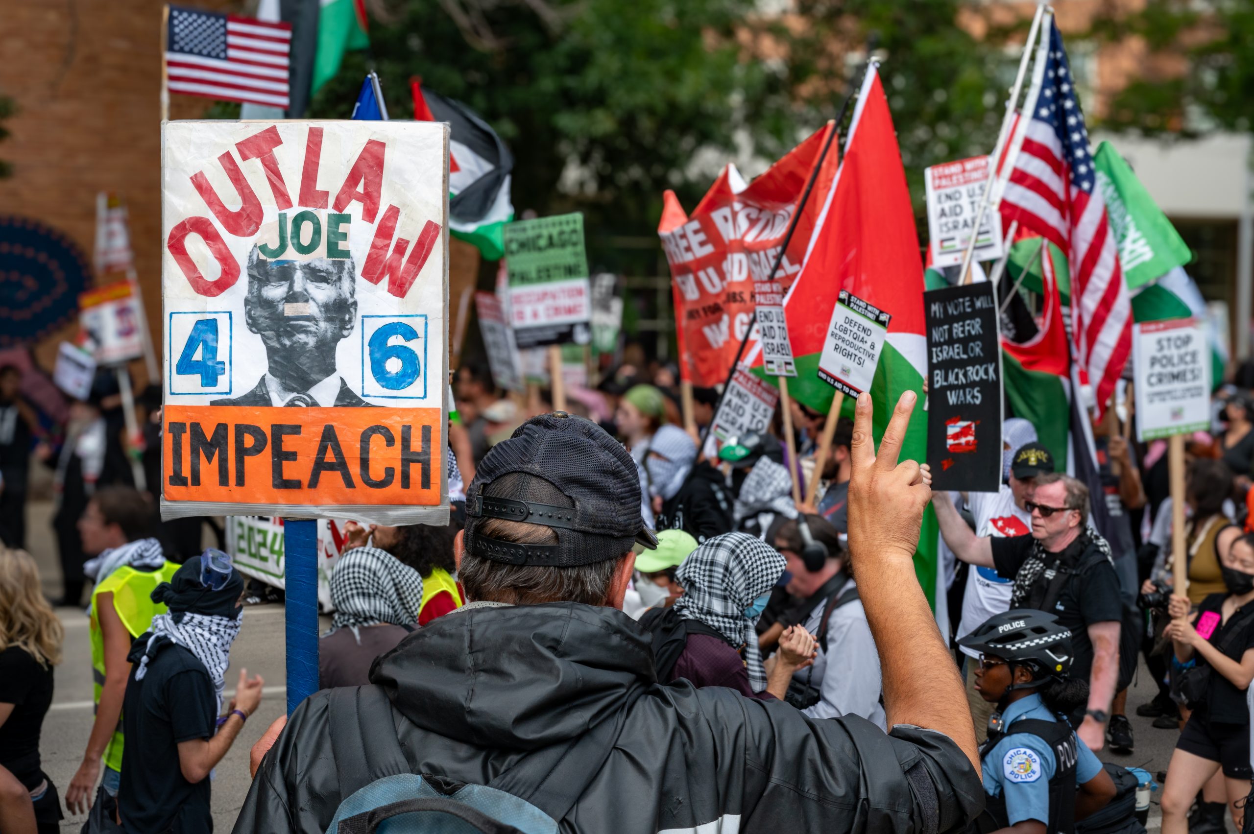 Pro-Palestinian and anti-war demonstrators march outside the Democratic National Convention in Chicago on Monday, Aug. 19, 2024.